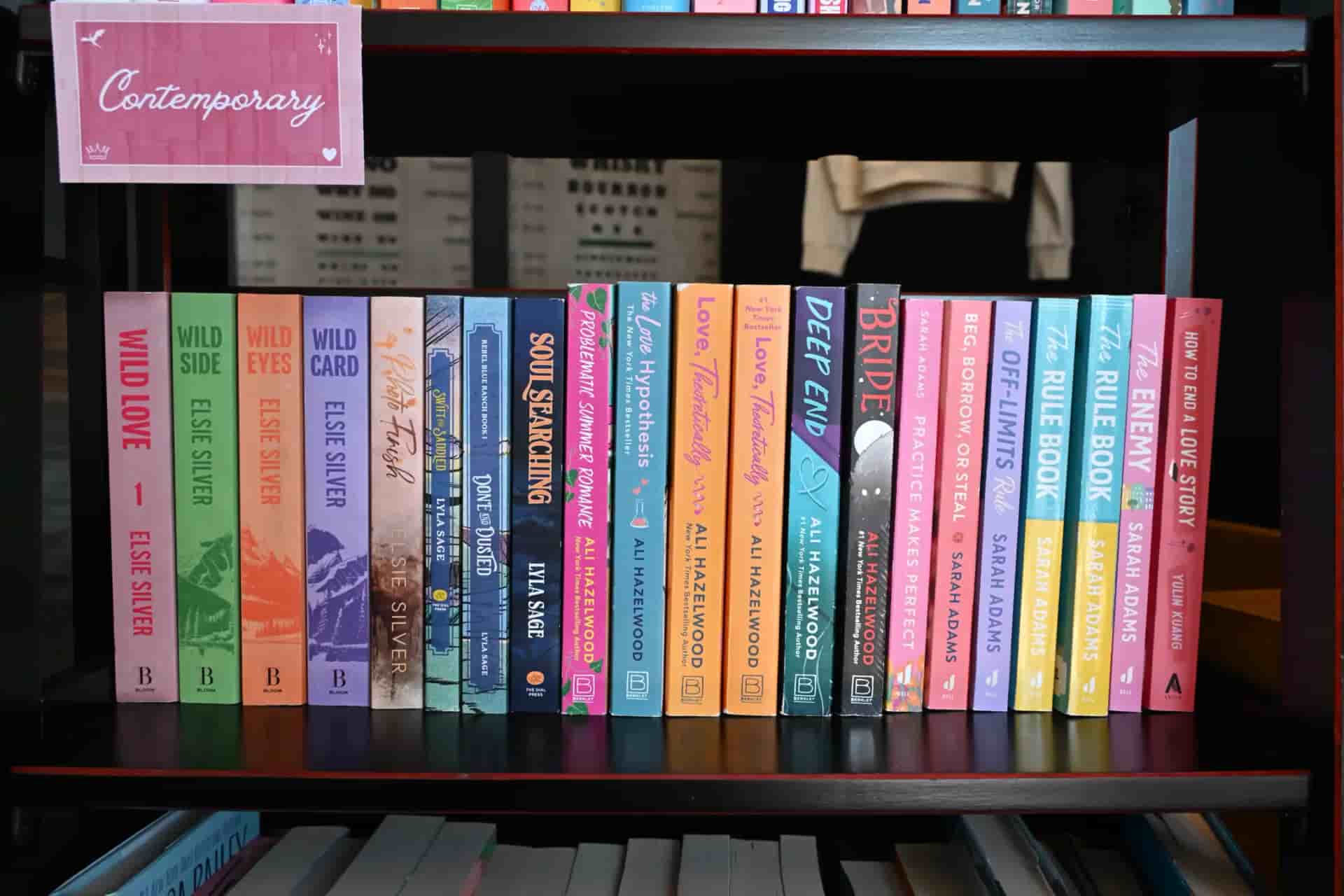 Books lined up on a shelf with label "contemporary"