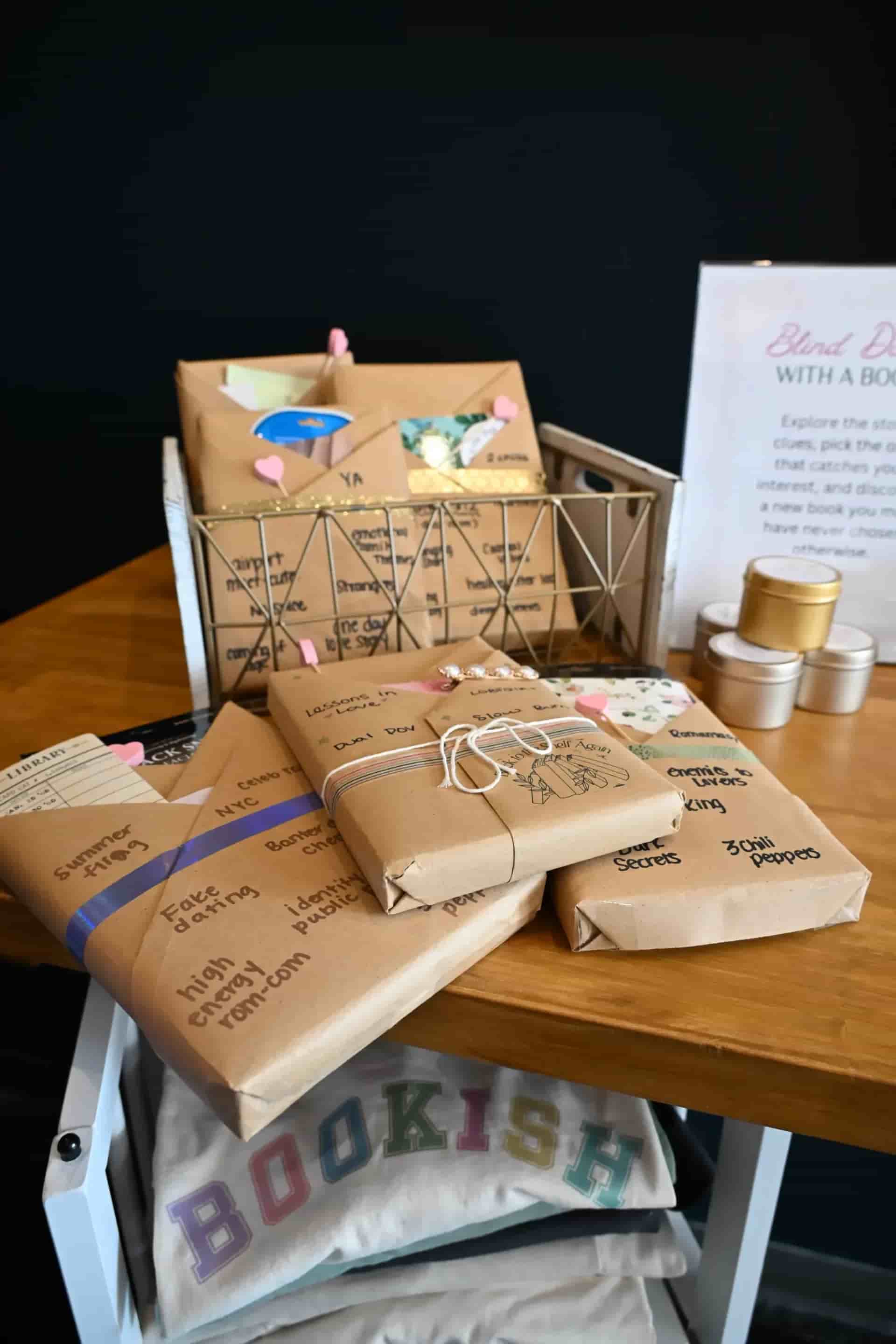 Books wrapped in brown paper next to a sign that says "Blind Date With a Book"